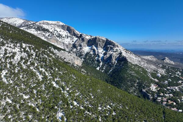 Aerial drone photo of snowed mountain of Parnitha as seen at winter the highest in Attica prefecture, Athens, Greece