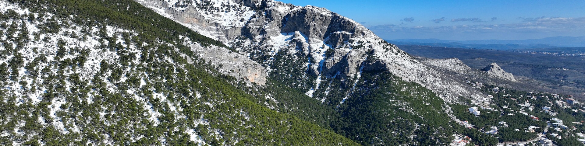 Aerial drone photo of snowed mountain of Parnitha as seen at winter the highest in Attica prefecture, Athens, Greece