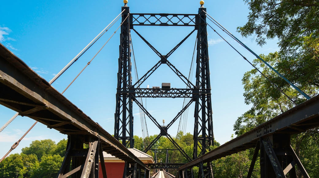 The Ticonic Footbridge, also known as the Two Cent Bridge, a historic 1903 suspension bridge over the Kennebec River, linking Waterville and Winslow in Kennebec County, Maine, USA