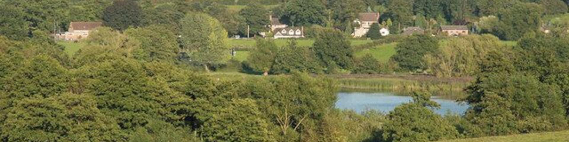 Betley Mere. Betley Mere is a site of Special Scientific Interest (SSSI) and is one of the few natural standing waters in Staffordshire and occupies a shallow valley in glacial deposits overlying Triassic strata bounded on three sides by extensive peat deposits on which a very diverse range of vegetation types have developed.