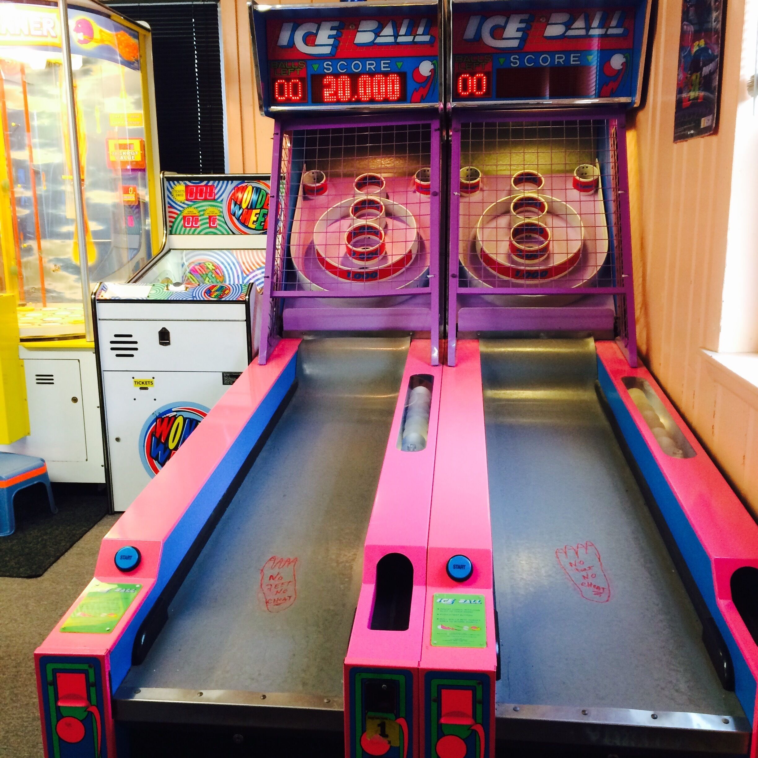 Candle pin bowling plus old school arcade. Pink skee ball.