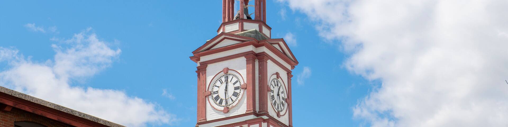 Historic Assabet Woolen Mill, built in 1847, on Main Street on Assabet River in Maynard historic town center in spring, Maynard, Massachusetts, USA.