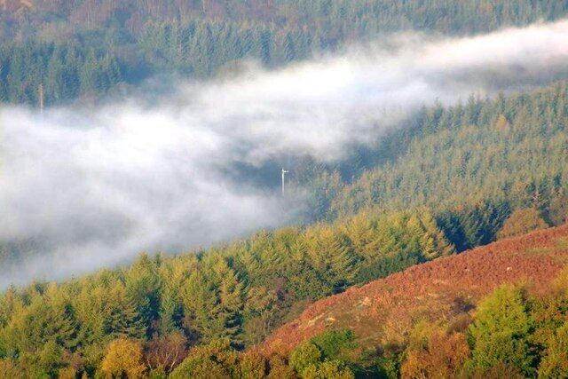The Distant Stop Signal Close to Levisham level crossing this preserved railway signal stands clear of the exhaust steam from a train to Whitby.