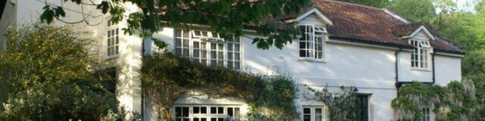 Canalside house, Murhill. A isolated house on the north bank of the Kennet and Avon Canal below Winsley.