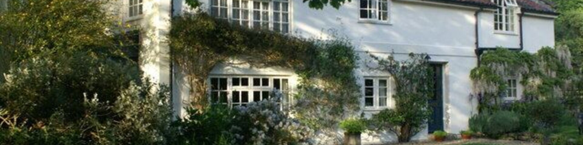 Canalside house, Murhill. A isolated house on the north bank of the Kennet and Avon Canal below Winsley.