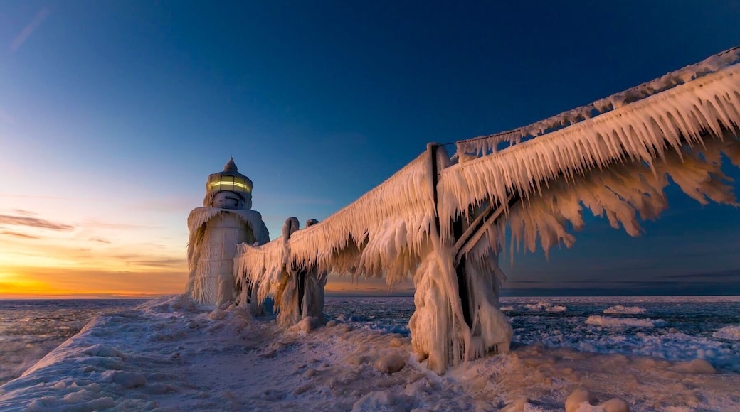 Spectacular place for winter sunsets! So cold! And so beautiful ❤️The St. Joseph North Pier Inner and Outer Lights are lighthouses in Michigan at the entrance to the St. Joseph River on Lake Michigan. The station was built in 1832 with the current lights built ...