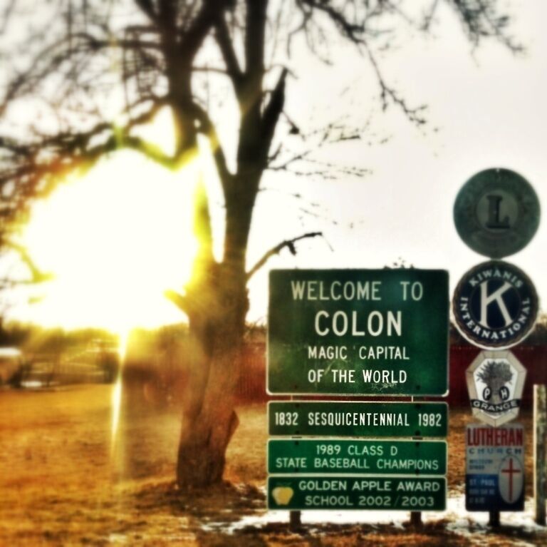 A sign welcoming visitors to Colon, highlighting its historical significance and achievements in baseball.