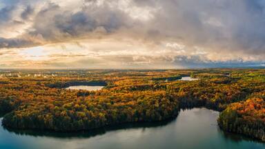 Spectacular autumn sunset over Pete’s Lake Campground in the Hiawatha National Forest – Michigan Upper Peninsula – aerial view