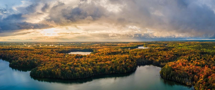 Spectacular autumn sunset over Pete’s Lake Campground in the Hiawatha National Forest – Michigan Upper Peninsula – aerial view