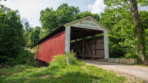 The Melcher Covered Bridge, also known as the Klondyke, Marion, or the Leatherwood Covered Bridge crosses Leatherwood Creek east of Montezuma in Parke County, Indiana