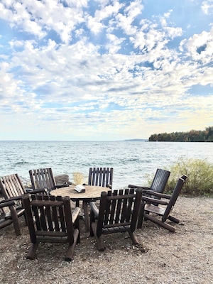 Beautiful cool fall day to sit in this spot with a glass of Leelanau Cellars wine.