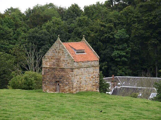 Doocot, Boarhills 168416, at the north end of the village may be more interesting architecturally, but this doocot at the southern end is in far better repair. The buildings behind are on the far side of Kenly Water. Seen from the A917.