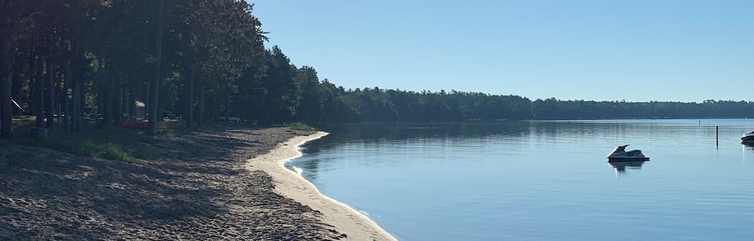 Early morning sunrise walk on the shores of Higgins Lake.