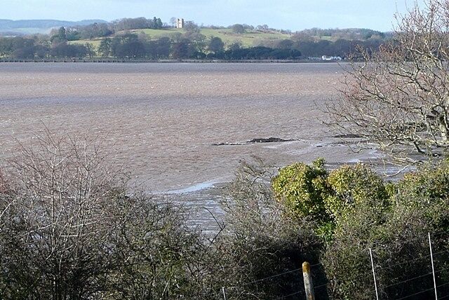 Across to Powderham A view from the cycle path adjacent to the railway line south of Lympstone. This looks across the Exe estuary towards Powderham Castle. The foreshore on this side is quite narrow at this point. It is still three hours before high tide.