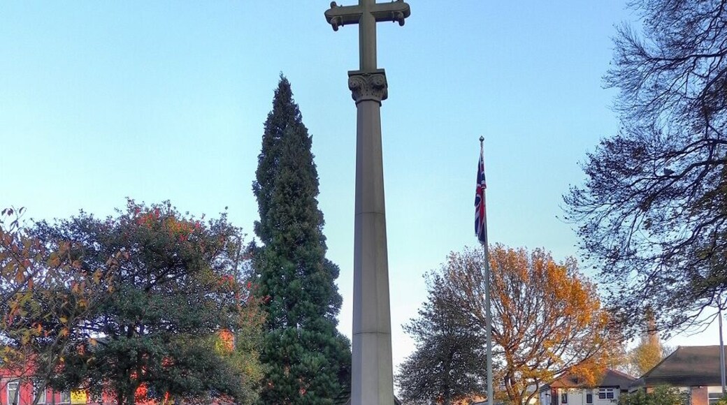 Photograph of the war memorial in the churchyard of St George's Church, Poynton, Cheshire, England