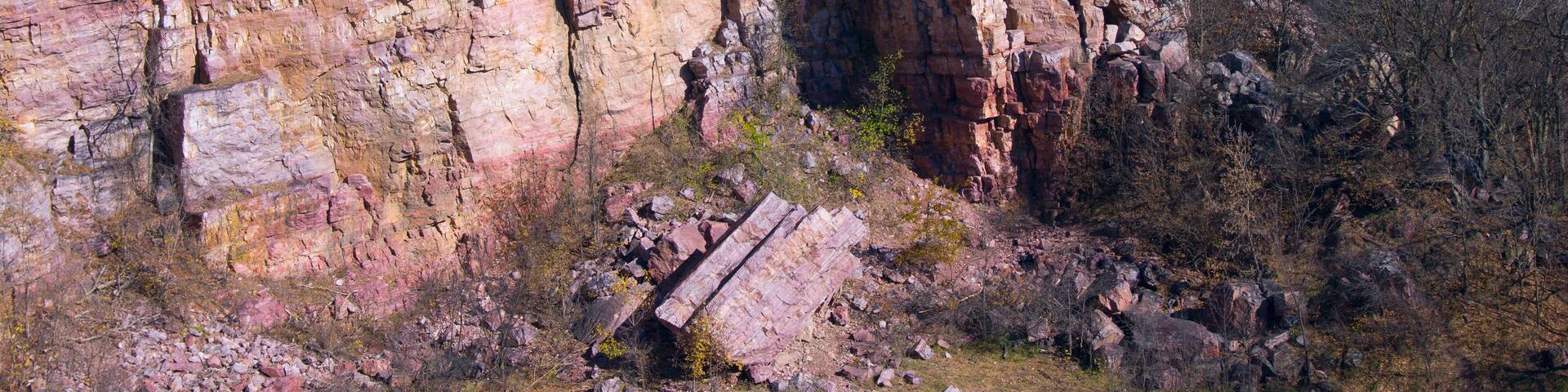 sioux quartzite cliffs and prairie surrounded by farmland at blue mounds state park of minnesota