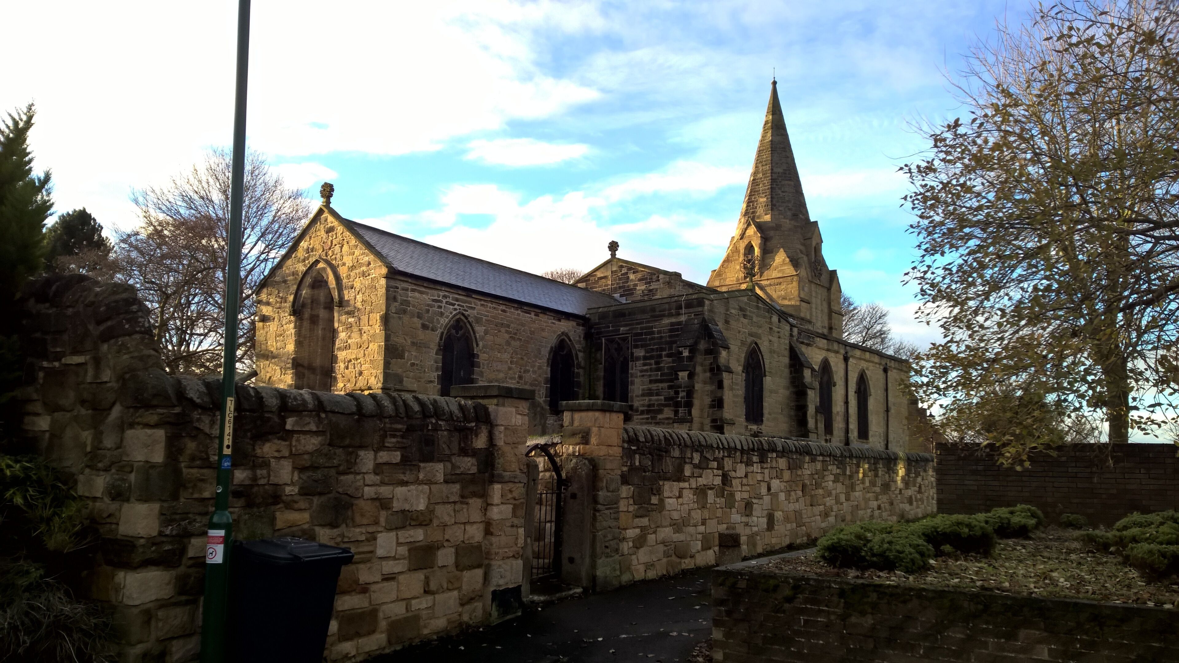Parish church of St Nicholas, West Boldon. Much early 13th-century fabric, but the core of the building is believed to date from AD 920 and some Saxon features remain. The early 13th-century stone spire is a great rarity.