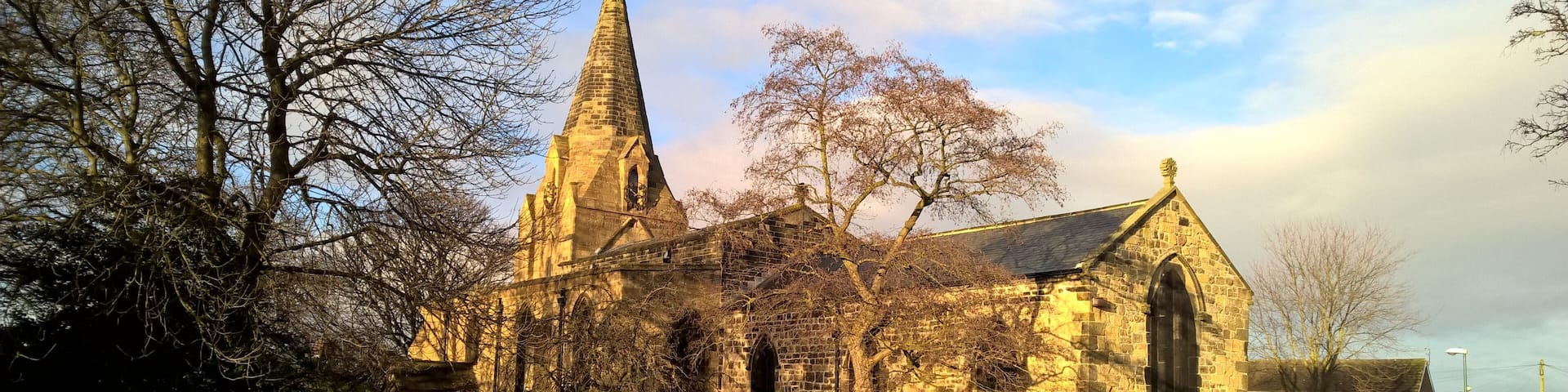 Parish church of St Nicholas, West Boldon. Much early 13th-century fabric, but the core of the building is believed to date from AD 920 and some Saxon features remain. The early 13th-century stone spire is a great rarity.