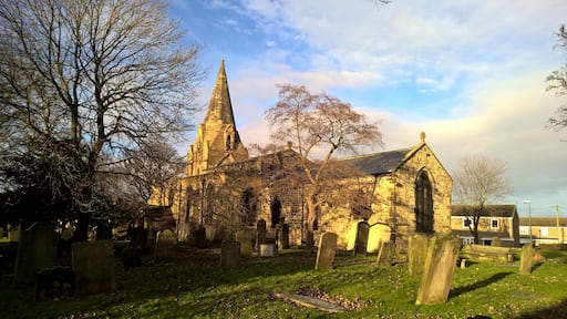 Parish church of St Nicholas, West Boldon. Much early 13th-century fabric, but the core of the building is believed to date from AD 920 and some Saxon features remain. The early 13th-century stone spire is a great rarity.