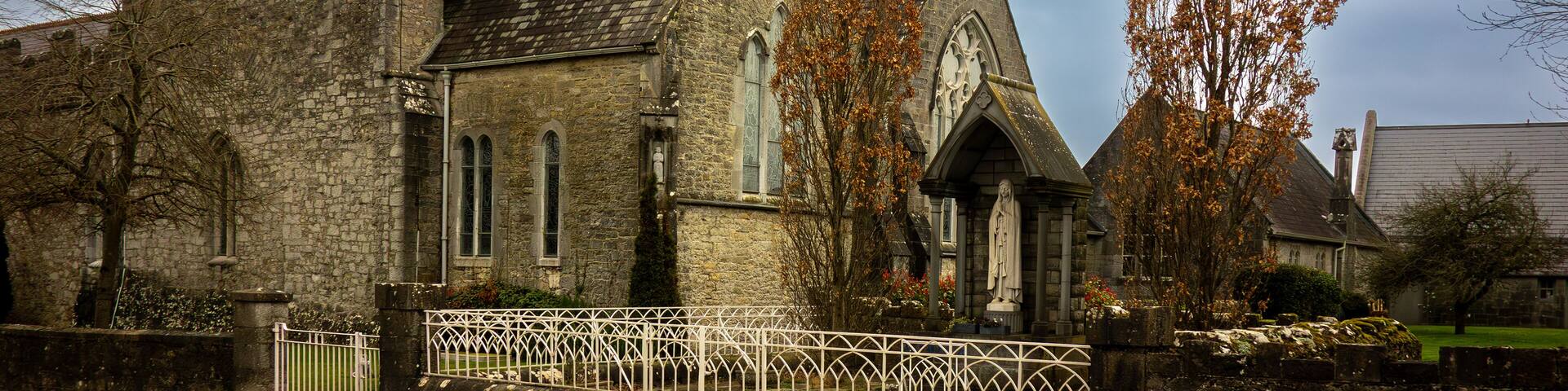 Holy Trinity Abbey Church in Adare, County Limerick, Ireland. Medieval Gothic Revival architecture. Roman Catholic parish church