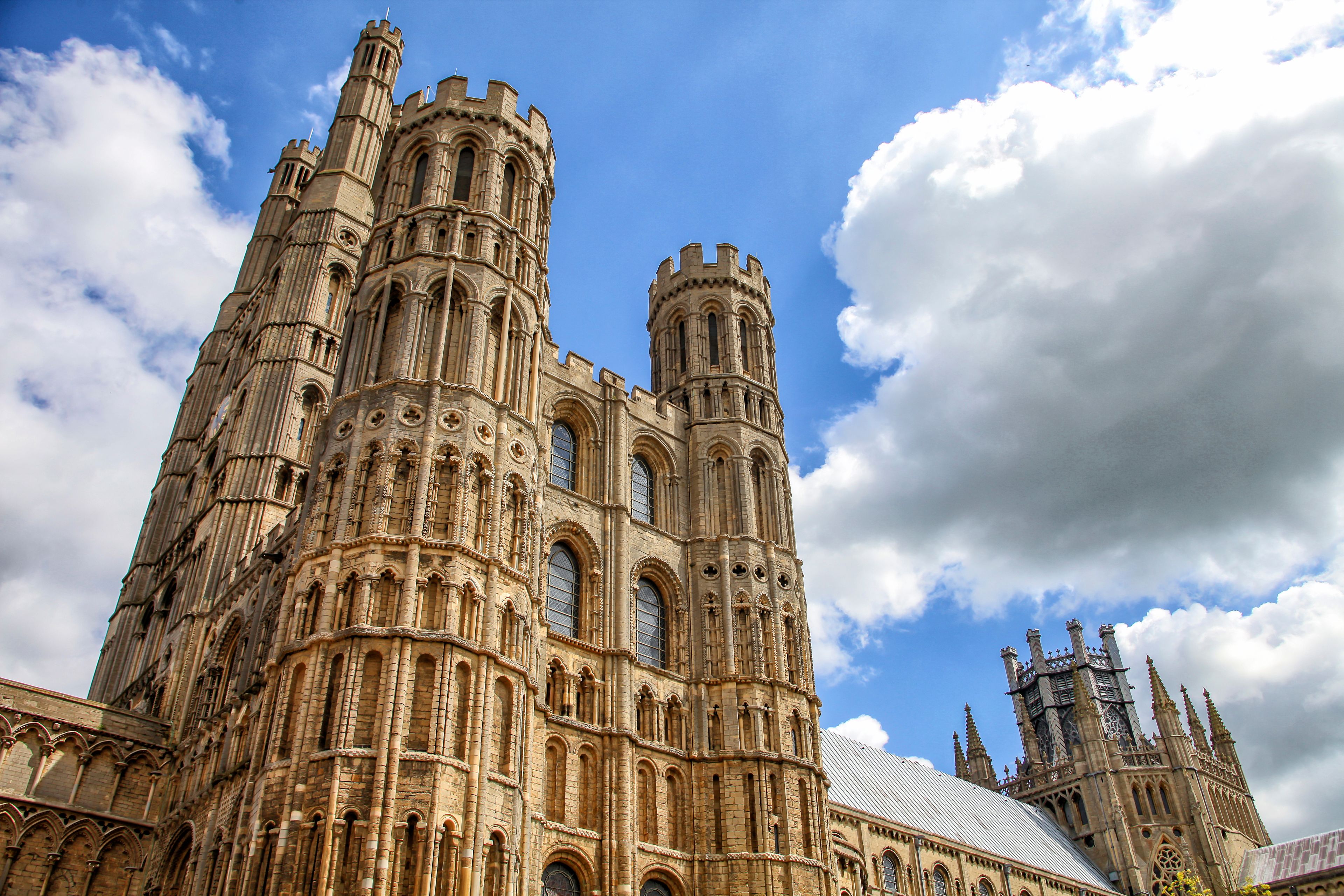 A historic cathedral with intricate Gothic architecture, featuring tall spires and detailed stonework.