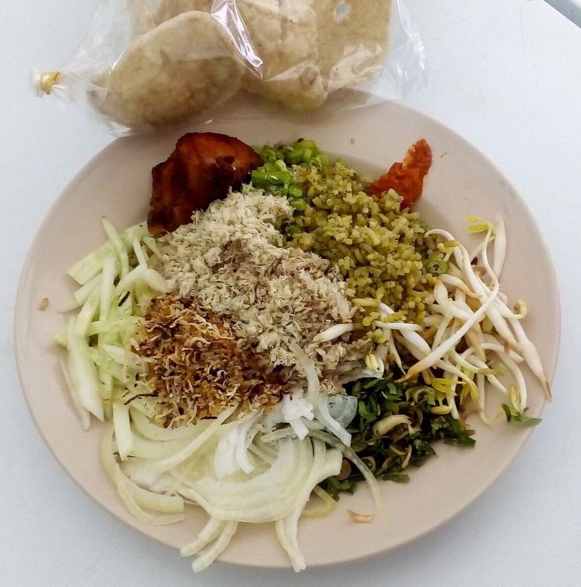 Khao Jam a Thai inspired version of the the Kelantanese Nasi Kerabu.
Kelantan a northern state of Malaysia bordering Thailand incorporates an interesting mix of Thai, Malay, Chinese and Indian ingredients and cooking techniques in its cuisine.
This state which is still underdeveloped compared to it’s contemporaries does not have fancy fine dining restaurants but often homely family run restaurants. 
More: https://wp.me/p7CVI8-1CI
#food #kelantan #malaysia #travel #travelblogger #mariadasstheworld