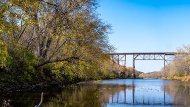 Railroad bridge crossing the Kettle River at Quarry Rapids Robinson State Park in Minnesota