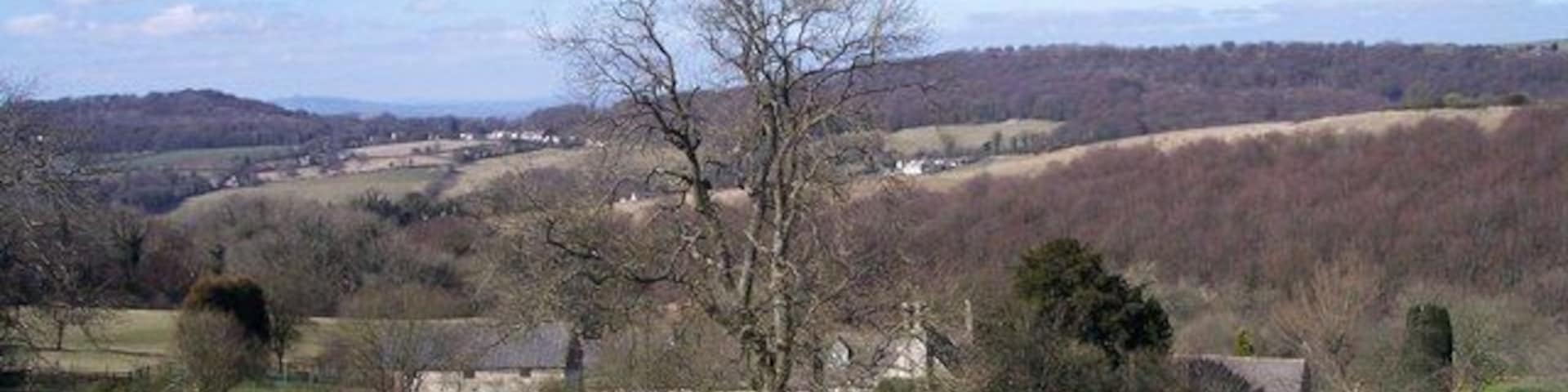 Overtown. In the south-east corner of the square. Looking north at this converted cotswold farmstead.