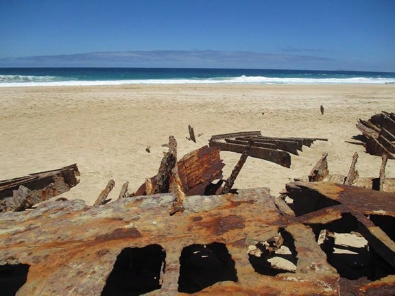 In Inneston National Park (10 dollar entry fee paid online).  There is a shipwreck along one of the beaches which you can climb down to (there are stairs), to go check out.  Definitely worth it to see an up close shipwreck.