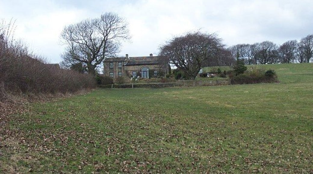Lower House, Lepton The house and garden is situated in a pastoral setting, viewed from the footpath approaching from the south. The hedgerow leaves from last autumn have not blown far.
