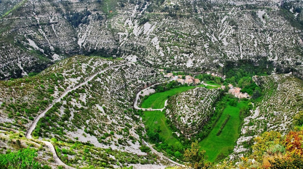 This stunning location is one of the deepest valleys in Europe. You can see the road leading down and it zig-zags up the other side. There's a small village at the bottom but there's a cafe on one lookout that has a wonderful view over this scene. Definitely worth a look if you're in the area.