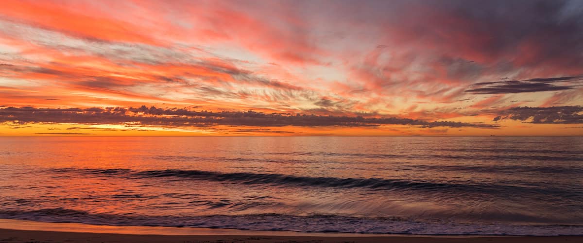 Colourful cloudy calm sunset at Bunbury, Western Australia