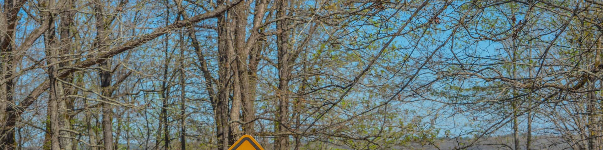 Road ends in water waning sign. At Enid Lake in Oakland, Mississippi