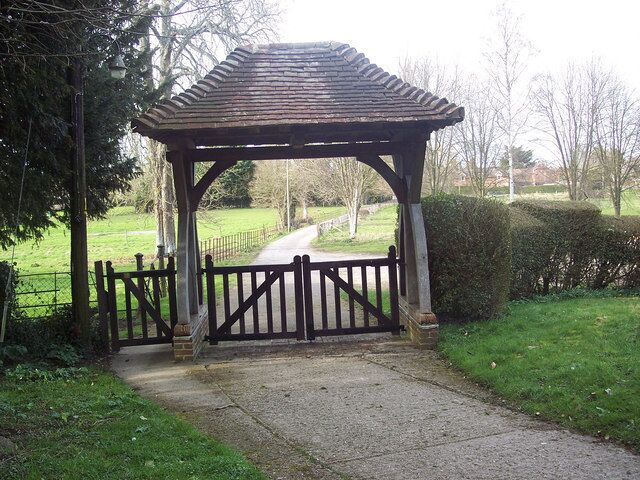 Lych gate, All Saints Church, Netheravon Many churches have a lych gate built over the main entrance to the enclosed area round the church. The name, also spelt lich or lytch, is from the Anglo Saxon 'lich' meaning corpse. The gate marks the division between consecrated and unconsecrated ground, where the bearers sheltered with the coffin, waiting for the clergyman to lead the procession before the burial.
