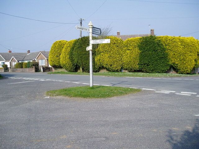 Which way now ? Signpost at five ways crossing.
