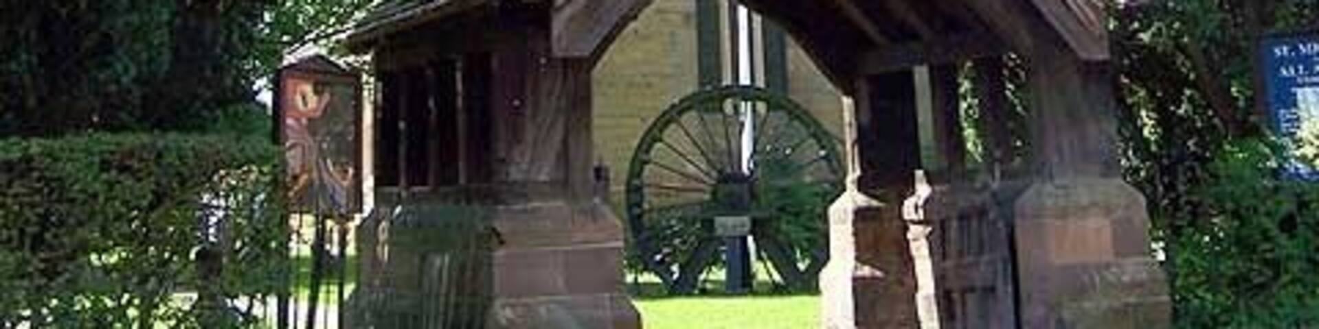 Underwood Church and Lychgate. The church and lychgate were designed by the Birmingham 'Gothic' architect, J. A. Chatwin in the style of the 14th century. They were erected in 1889 after being commissioned at a cost of £5000 by the 7th Earl Cowper who was a British Liberal politician and also served as Lord Lieutenant of Ireland between 1880 and 1882. The church dedicated to St Michael & All Angels had the clock installed in 1920 as a memorial to the local men who died in the First World War. The spire is visible from the surrounding countryside and is notable for being covered by oak shingles.