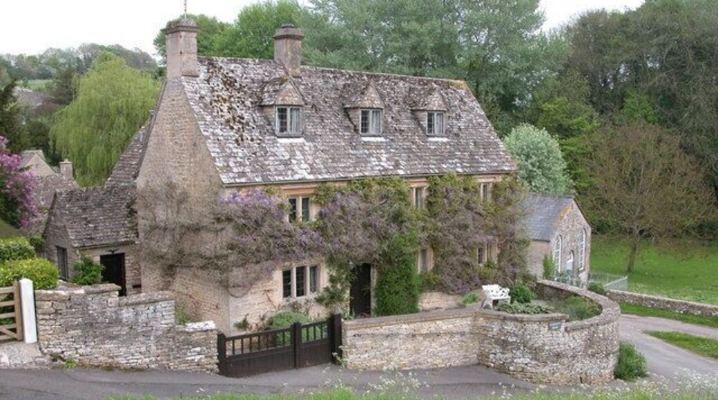 A picturesque Cotswold stone house located by the church in Duntisbourne Abbots.