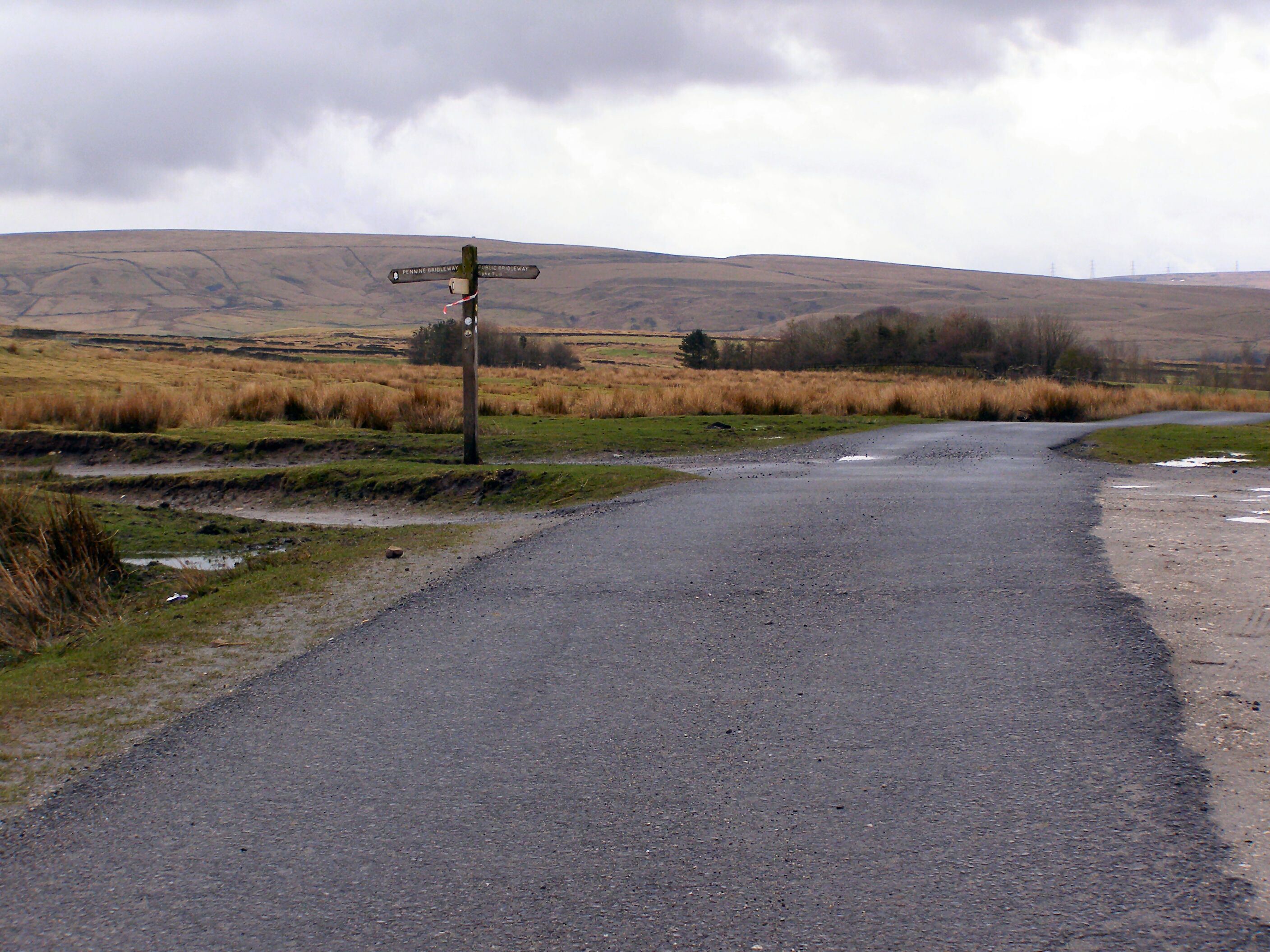 Bridleway Crossing The Pennine Bridleway crosses Rochdale Way on the moorland at Lobden.