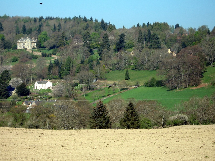 The Woll viewed from the layby on the A7 south of Ashkirk Ale Water flows from left to right in the valley between the bare field in the foreground and The Woll on the hillside beyond. Near Ancrum, it joins the River Teviot, which enters the River Tweed near Kelso.