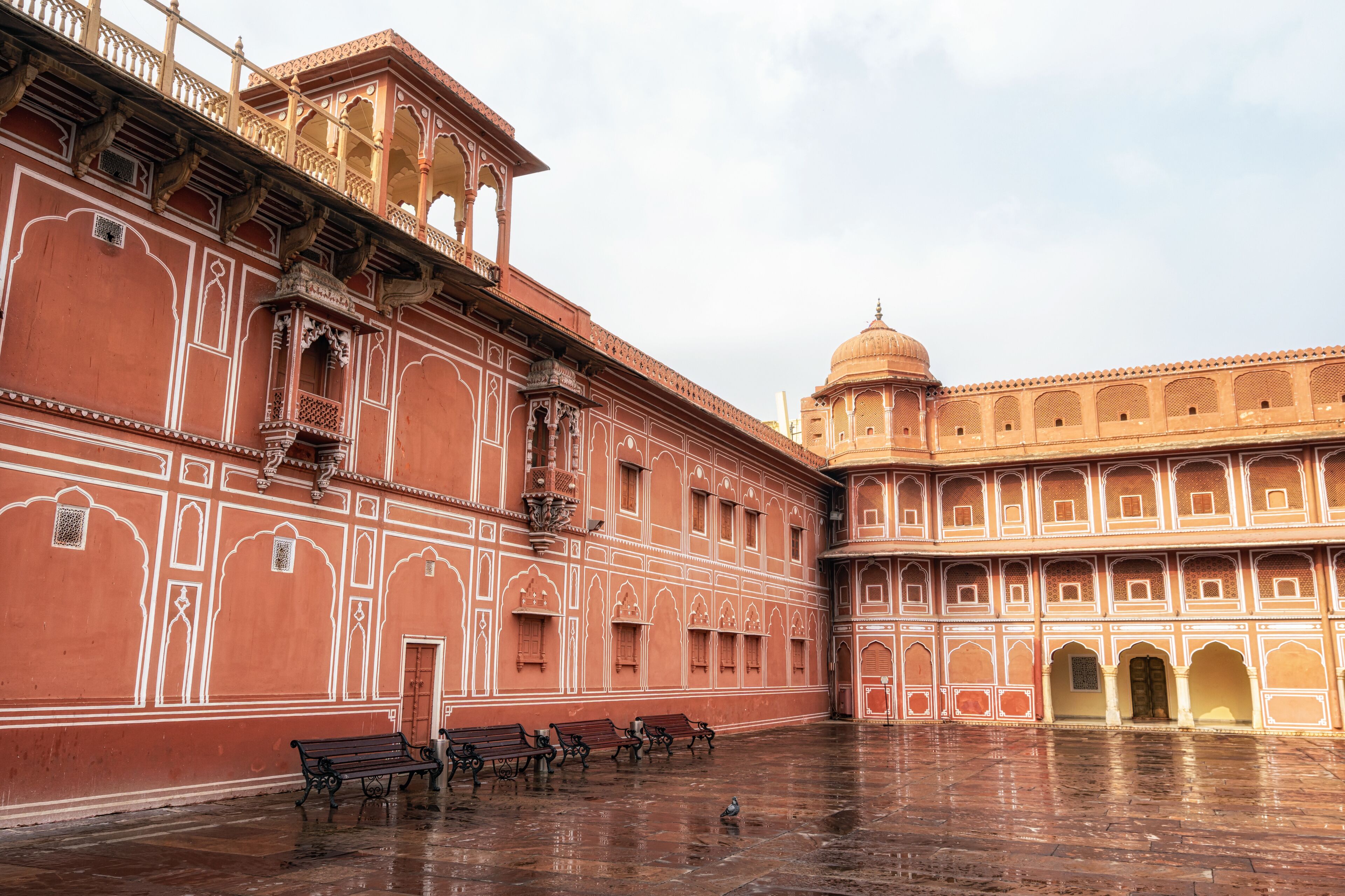 A historic building with intricate architecture and a dome structure.