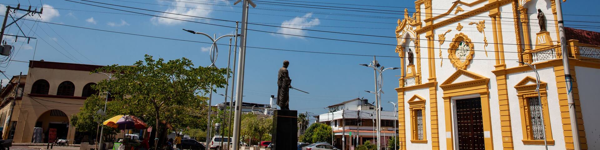 View of the Simon Bolivar Park and the beautiful historical Cathedral of Santa Cruz de Lorica a cultural symbol founded in 1700.