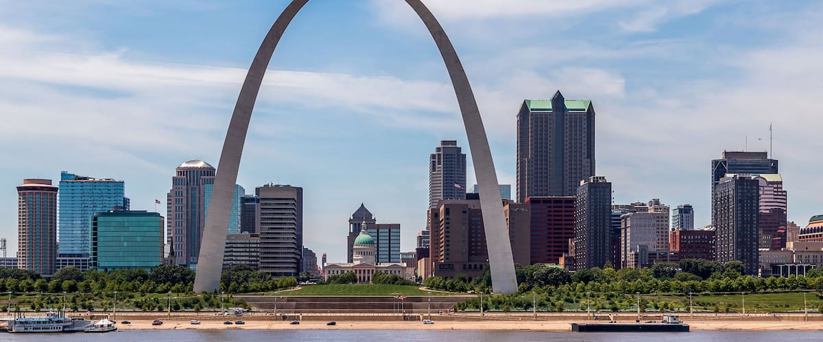 View of St. Louis and the historic Gateway Arch in Missouri, from across the Mississippi River in Malcolm W. Martin Memorial Park, Illinois