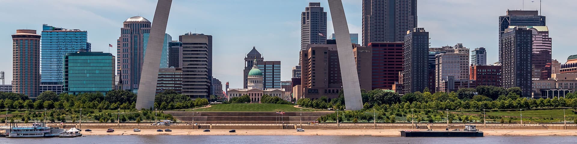 View of St. Louis and the historic Gateway Arch in Missouri, from across the Mississippi River in Malcolm W. Martin Memorial Park, Illinois