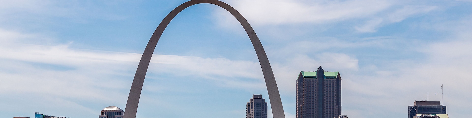 View of St. Louis and the historic Gateway Arch in Missouri, from across the Mississippi River in Malcolm W. Martin Memorial Park, Illinois