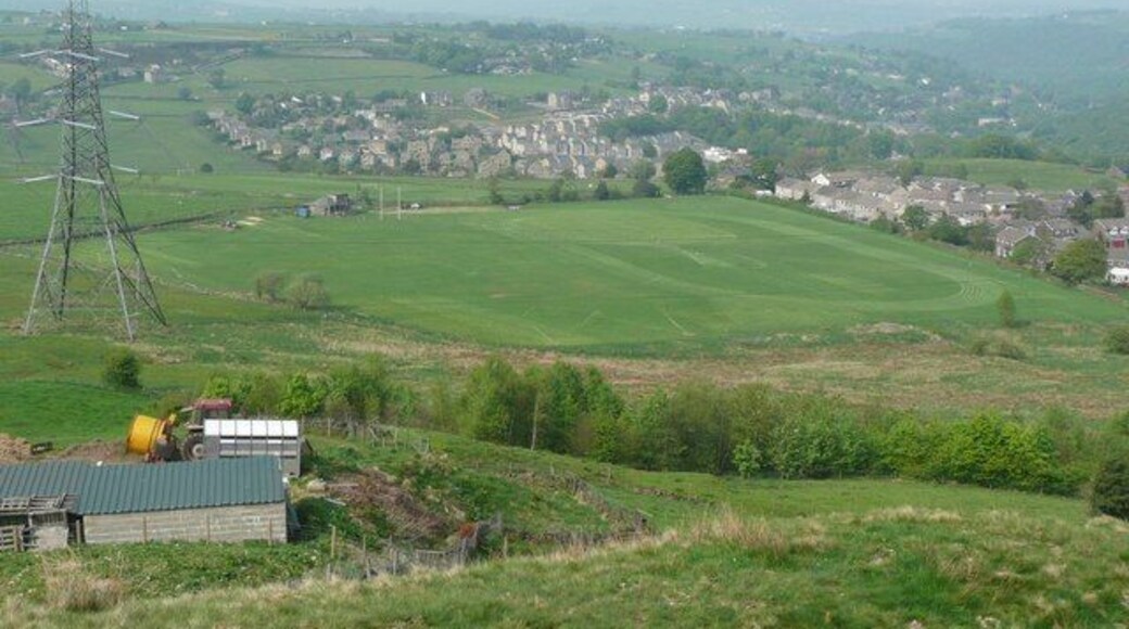 Sports Ground,Rishworth New Road, Rishworth. A grass running track and Rugby goal posts. Also a football ground on the far side of Rishworth New Road.