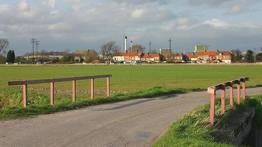 Thorntree Drain Bridge, Rawcliffe Bridge, East Riding of Yorkshire, England. The bridge over Thorntree Drain, on Moor Road at Rawcliffe Bridge. The houses of Rawcliffe Bridge are in the background.