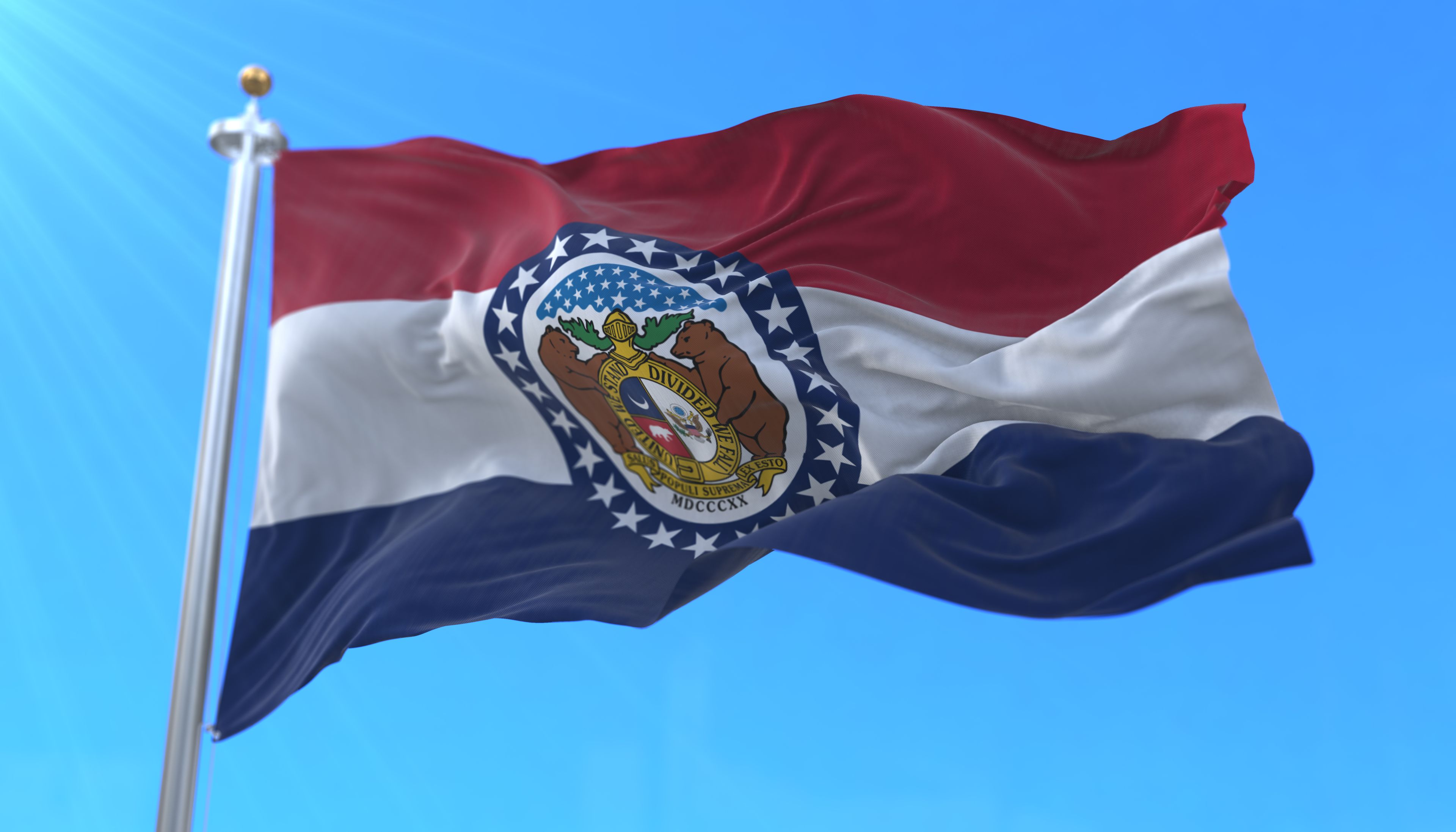 Flag of american state of Missouri, region of the United States, waving at wind