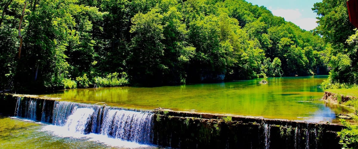 Rockbridge is an unincorporated community in northern Ozark County, Missouri. It is the site of an old mill on spring fed Spring Creek a tributary of Bryant Creek, which still houses the post office. It is twelve miles north of Gainesville, Missouri. On the property there is a gristmill, a post office general store and lodging options.
Oh my gosh! What a stunning place. It takes awhile to get there, but man is it worth the trip. Such a serene setting! I took my parents for breakfast, there is a fantastic restaurant in the general store, then we went and looked at the mill, creek, dam and trout hatchery! When the pub opened (Its inside the 1800’s grist mill btw) I set my parents down and they watched the anglers trying to catch the trout in the creek below. While they observed the action, I walked around to take pics of all the scenery.
From the pub you have a unique vantage point as you can see hundreds of fish in the water below that are not visible to the people fishing at ground level, so it’s fun to try and guess who will and won’t catch a fish!
Let’s talk about the people there. Each and every person was truly amazing. So friendly and hospitable. They really made you enjoy your time there!
I can’t wait to go back!
#LIFEATEXPEDIA #STAYCATION #IHEARTTRAVEL #ROCKBRIDGE #WATERMILLS #OZARKSBEAUTY #LIKEALOCAL