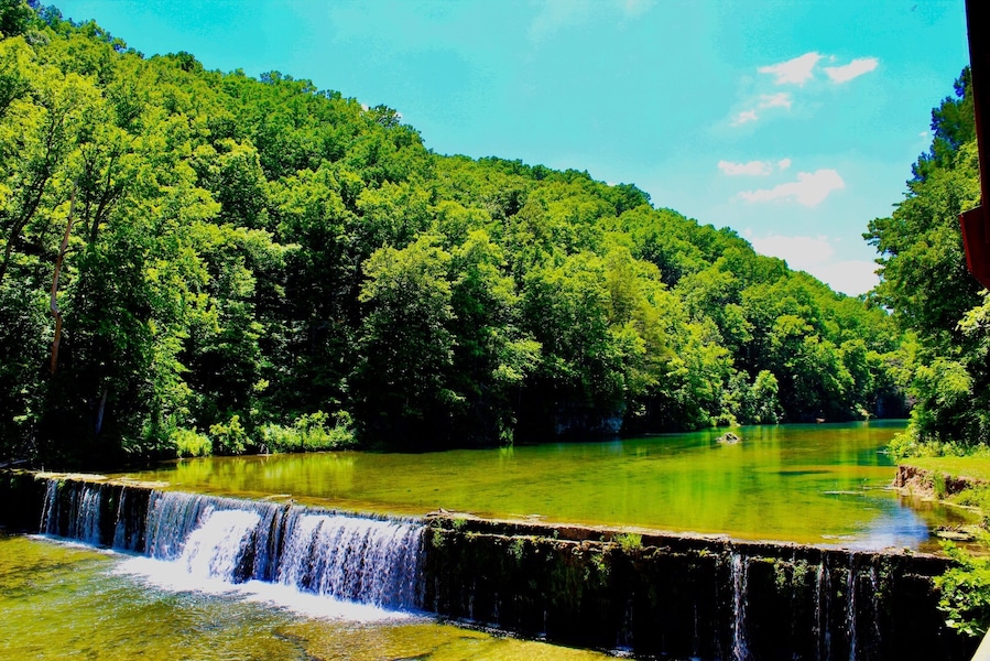 Rockbridge is an unincorporated community in northern Ozark County, Missouri. It is the site of an old mill on spring fed Spring Creek a tributary of Bryant Creek, which still houses the post office. It is twelve miles north of Gainesville, Missouri. On the property there is a gristmill, a post office general store and lodging options.
Oh my gosh! What a stunning place. It takes awhile to get there, but man is it worth the trip. Such a serene setting! I took my parents for breakfast, there is a fantastic restaurant in the general store, then we went and looked at the mill, creek, dam and trout hatchery! When the pub opened (Its inside the 1800’s grist mill btw) I set my parents down and they watched the anglers trying to catch the trout in the creek below. While they observed the action, I walked around to take pics of all the scenery.
From the pub you have a unique vantage point as you can see hundreds of fish in the water below that are not visible to the people fishing at ground level, so it’s fun to try and guess who will and won’t catch a fish!
Let’s talk about the people there. Each and every person was truly amazing. So friendly and hospitable. They really made you enjoy your time there!
I can’t wait to go back!
#LIFEATEXPEDIA #STAYCATION #IHEARTTRAVEL #ROCKBRIDGE #WATERMILLS #OZARKSBEAUTY #LIKEALOCAL