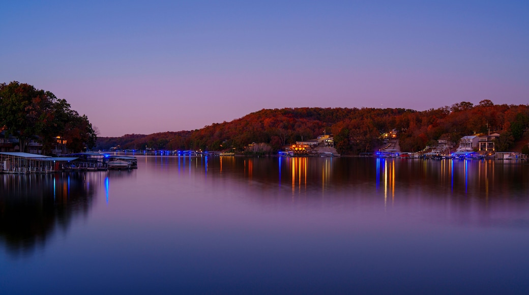 Lake of the Ozarks in Rocky Mount Missouri, USA: A tranquil autumn sunset view with light reflections on the calm water